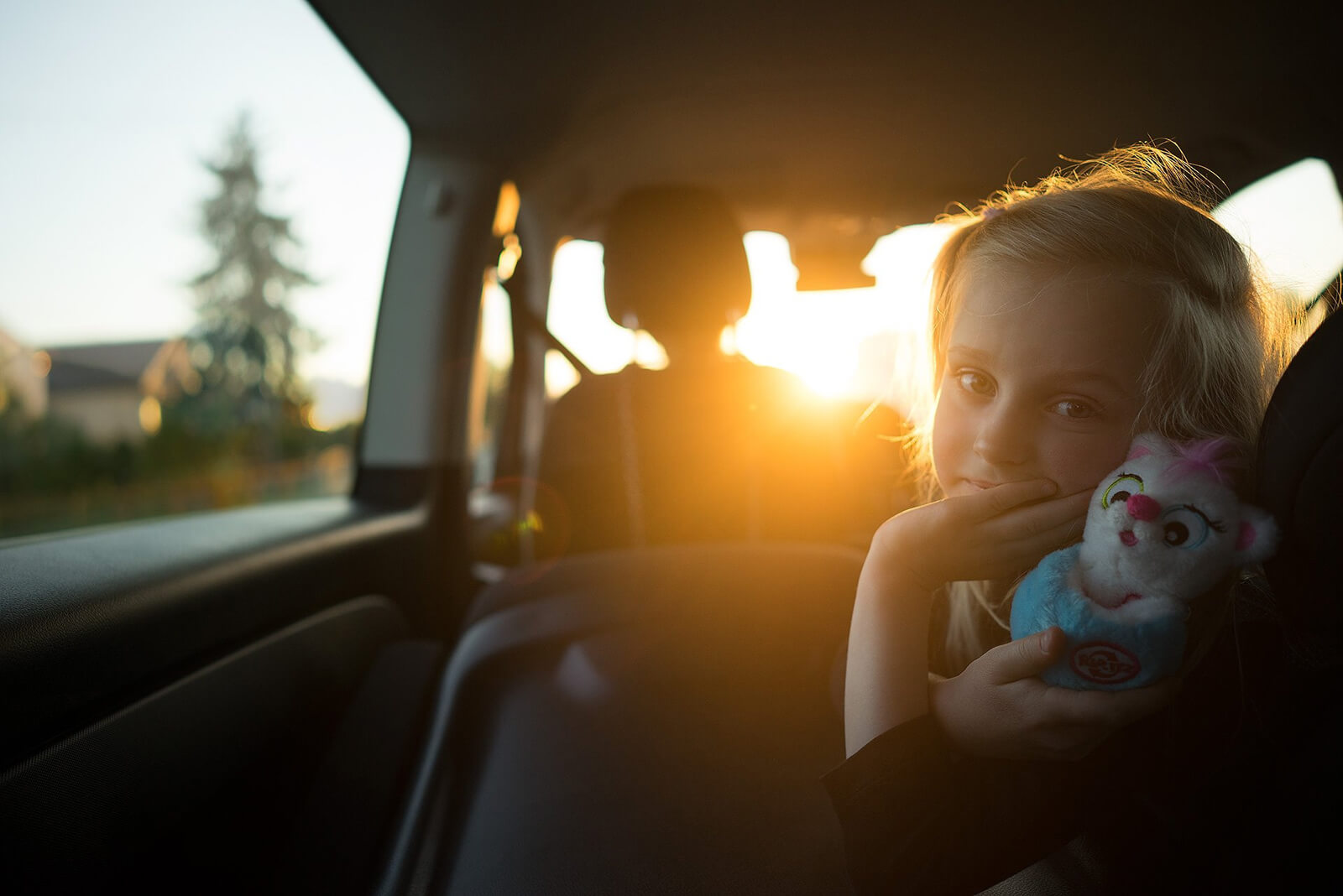 ffe child in car sunset